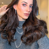 Gold skeleton stud earrings with white cubic zirconia stones by Rosie Fortescue Jewellery