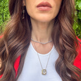 Model wearing silver CZ tennis necklace — demi-fine white stone tennis necklace UK