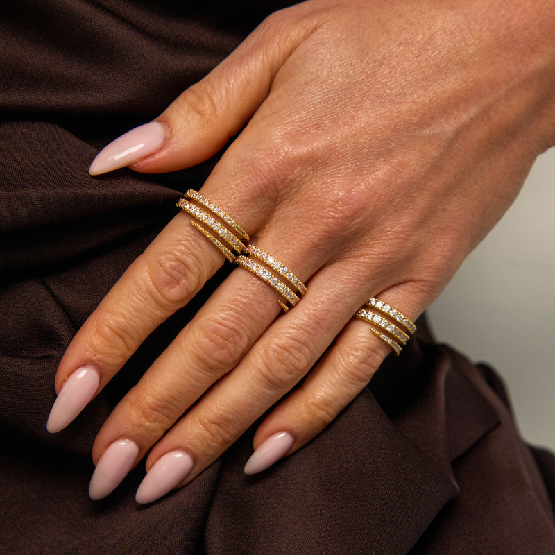 Gold Swirl Ring with White Stones