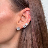 Model wearing small silver CZ diamond studs — everyday demi-fine stud earrings