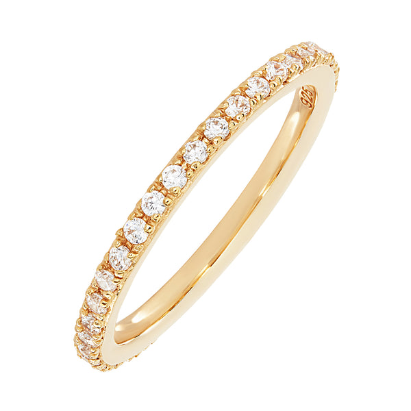 A thin gold stacking ring, embellished in small circular white cubic zirconia stones. 